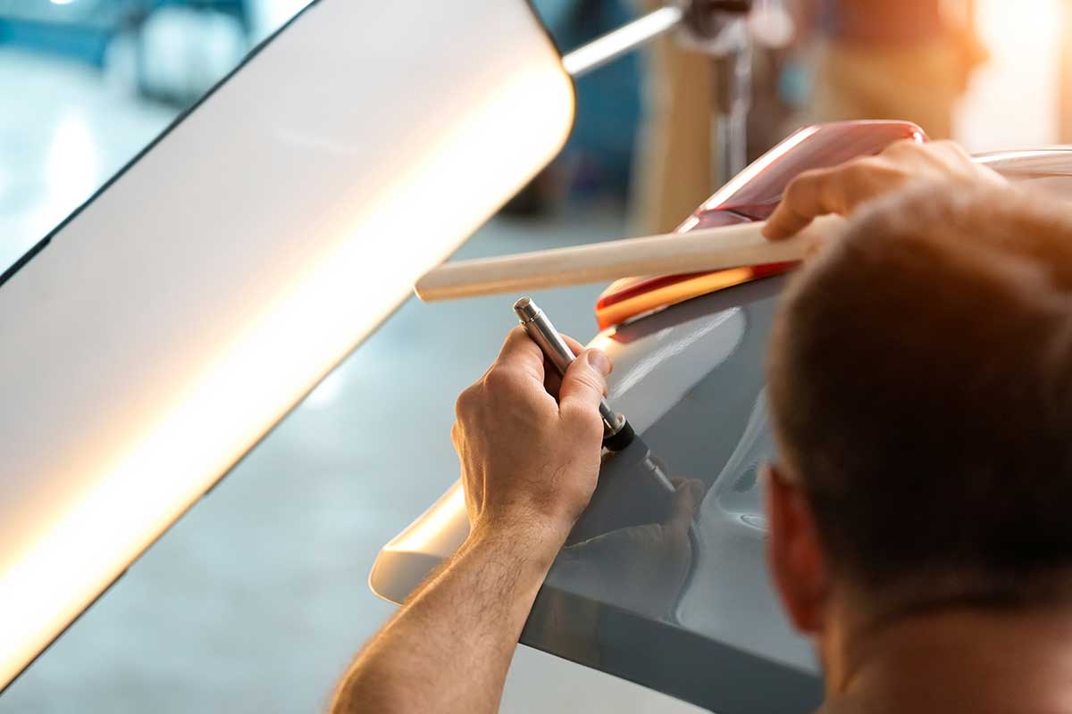 paintless dent repair photo from Adobe Stock