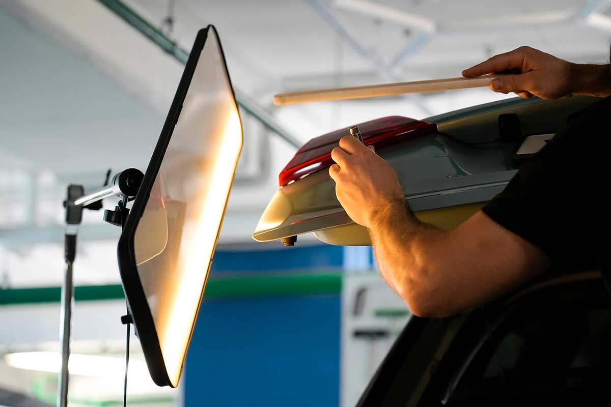 paintless dent repair photo from Adobe Stock