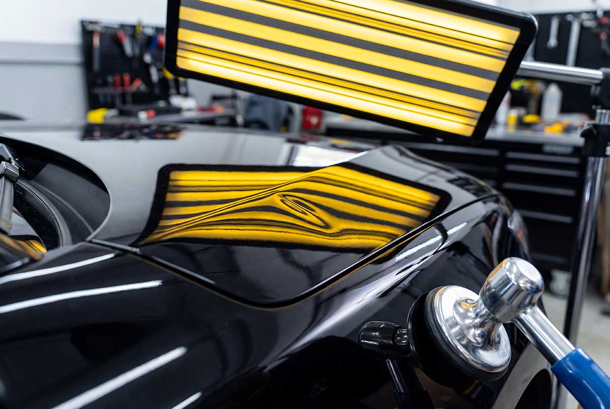 paintless dent repair photo from Adobe Stock